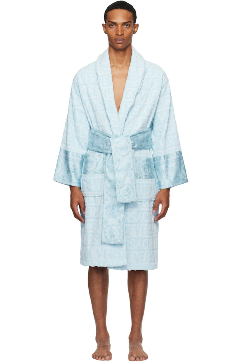 Cotton terrycloth bathrobe. Jacquard logo pattern and Barocco-printed poplin trim throughout.

· Shawl collar
· Belt loops and detachable self-tie belt
· Patch pockets

Supplier color: Light blue