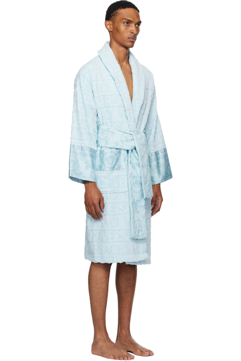 Cotton terrycloth bathrobe. Jacquard logo pattern and Barocco-printed poplin trim throughout.

· Shawl collar
· Belt loops and detachable self-tie belt
· Patch pockets

Supplier color: Light blue