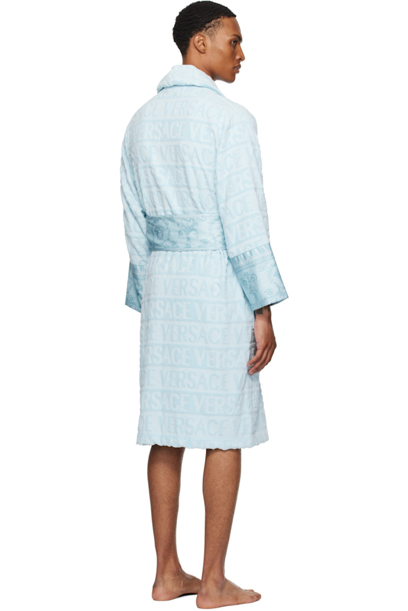 Cotton terrycloth bathrobe. Jacquard logo pattern and Barocco-printed poplin trim throughout.

· Shawl collar
· Belt loops and detachable self-tie belt
· Patch pockets

Supplier color: Light blue