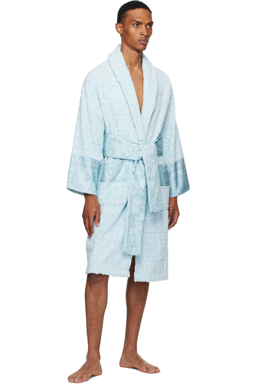 Cotton terrycloth bathrobe. Jacquard logo pattern and Barocco-printed poplin trim throughout.

· Shawl collar
· Belt loops and detachable self-tie belt
· Patch pockets

Supplier color: Light blue