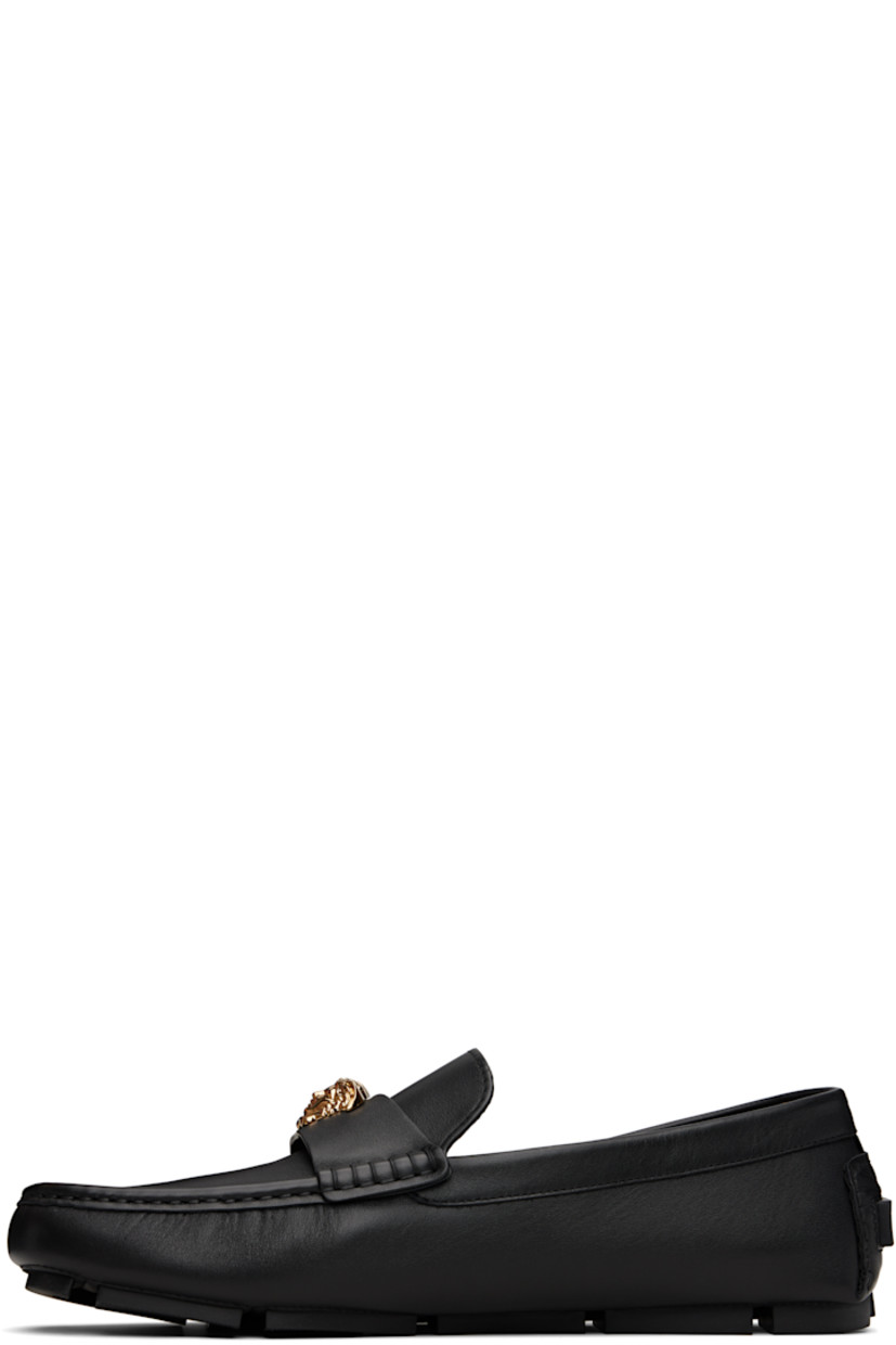 Calfskin loafers.

· Moc toe
· Medusa hardware at vamp strap
· Rubberized logo patch at heel counter
· Buffed goatskin lining
· Treaded rubber sole

Part of the La Vacanza collection.

Supplier color: Black/Gold