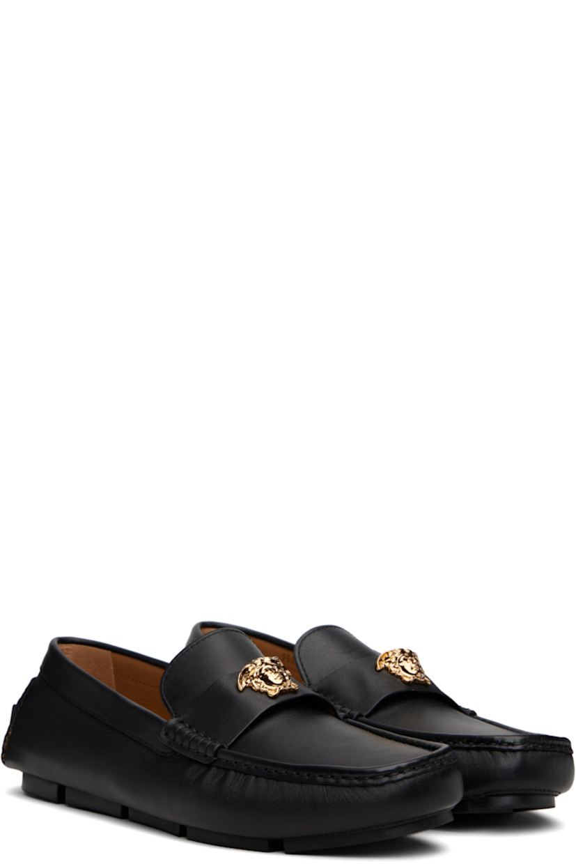 Calfskin loafers.

· Moc toe
· Medusa hardware at vamp strap
· Rubberized logo patch at heel counter
· Buffed goatskin lining
· Treaded rubber sole

Part of the La Vacanza collection.

Supplier color: Black/Gold