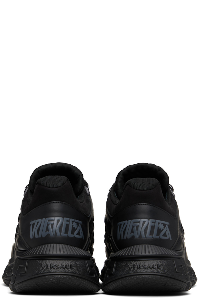 Low-top canvas and buffed calfskin sneakers.

· Jacquard Barocco pattern throughout
· Logo patch at lace-up closure and tongue
· Padded tongue and collar
· Logo and text printed at sides
· Text embossed at heel counter
· Logo embossed at heel
· Greek key-embossed textured rubber midsole
· Treaded rubber sole

Supplier color: Black