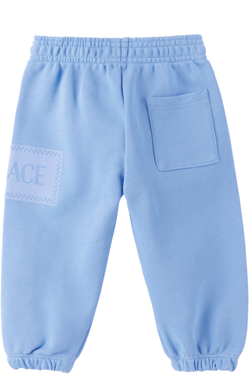 French terry sweatpants.

· Elasticized waistband
· Logo bonded at outseam
· Elasticized cuffs
· Patch pocket at back
· Machine-wash

Supplier color: Blue 

Versace Size: child's height 
12M: 30" / 76 cm 
18M: 34" / 86 cm 
2Y: 36" / 92 cm 
3Y: 38.5" / 98 cm 
4Y: 41" / 104 cm 
5Y: 43.5" / 110 cm 
6Y: 45.5" / 116 cm 
8Y: 50.5" / 128 cm 
10Y: 55" / 140 cm 
12Y: 60" / 152 cm 
14Y: 64.5" / 164 cm