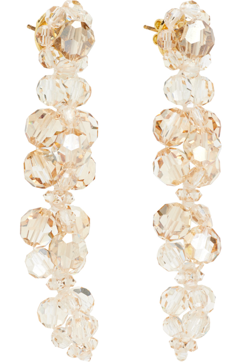 Pair of beaded glass drop earrings.

· Post-stud fastening 
· Gold-tone brass hardware
· H2.75" x W0.5"

Supplier color: Biscuit