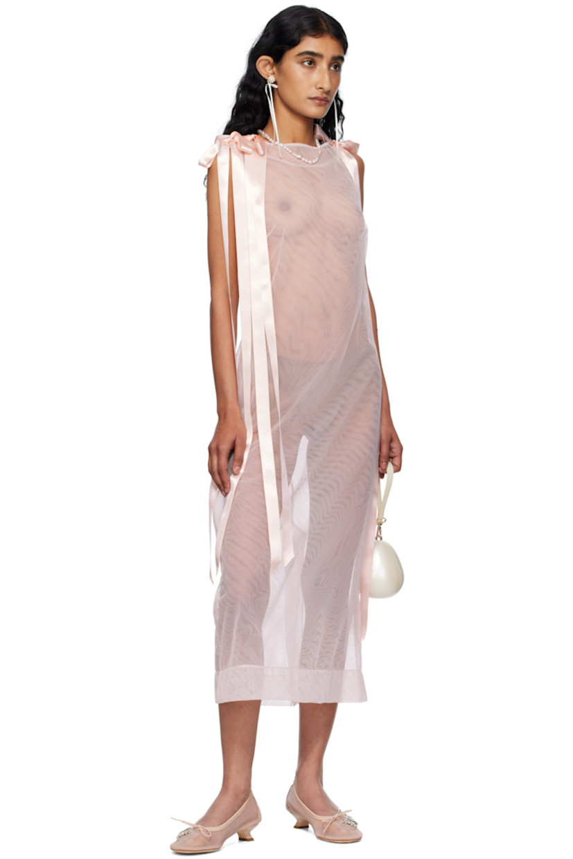 Sheer nylon tulle midi dress.

· Boatneck
· Darts at chest
· Seam pockets
· Bow appliqués at shoulders
· Zip closure at back
· Central vent at back hem

Supplier color: Pale Pink