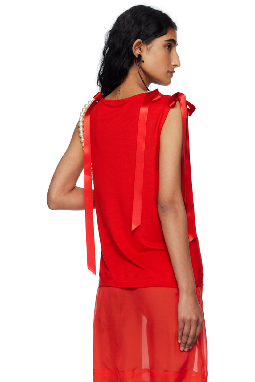 Lyocell jersey tank top.

· Boatneck
· Bow appliqués at shoulders

Supplier color: Red