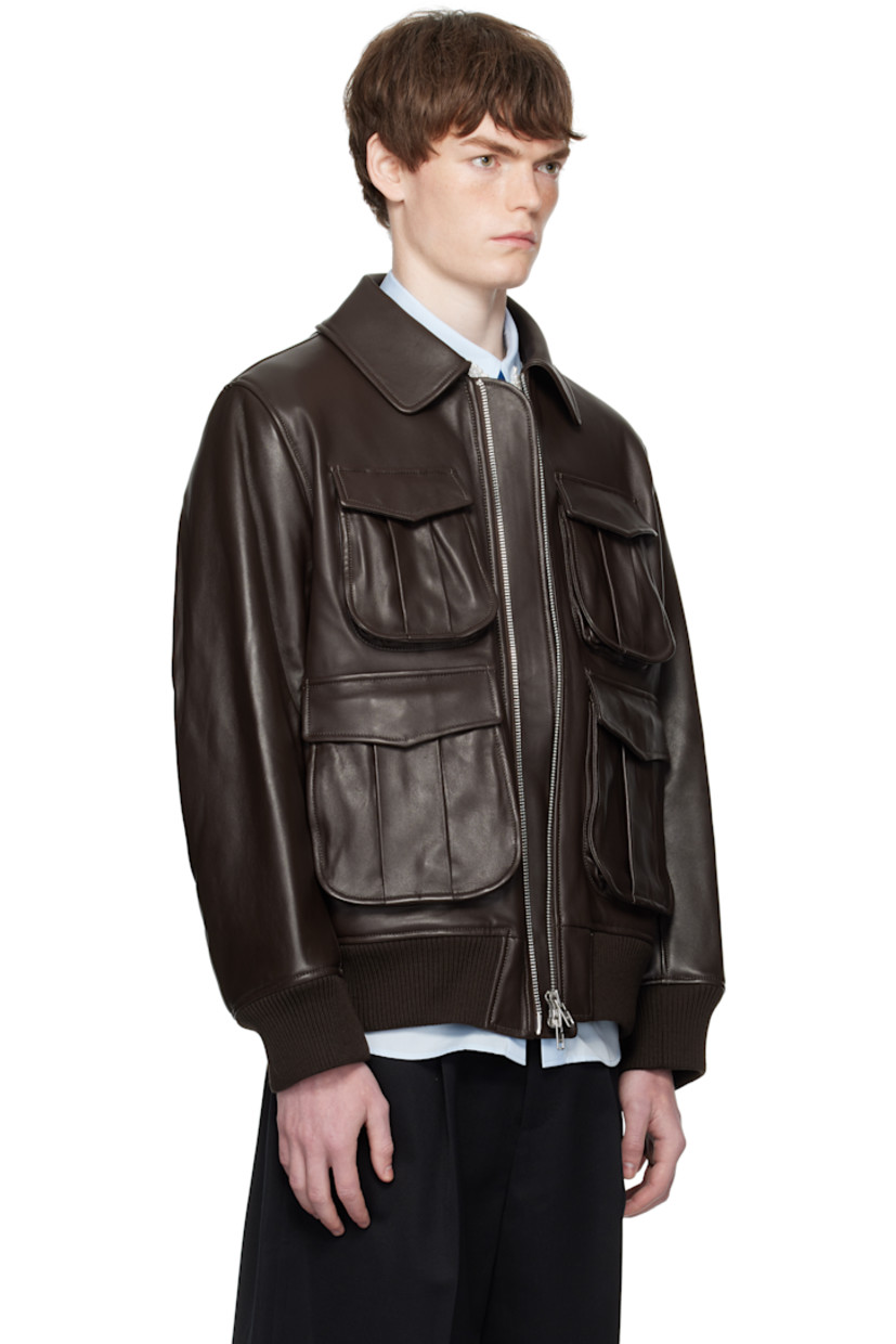 Padded buffed nappa lambskin jacket.

· Spread collar
· Two-way zip closure
· Bellows pockets at front
· Rib-knit merino wool hem and cuffs
· Welt pocket at interior
· Full satin lining

Supplier color: Chocolate