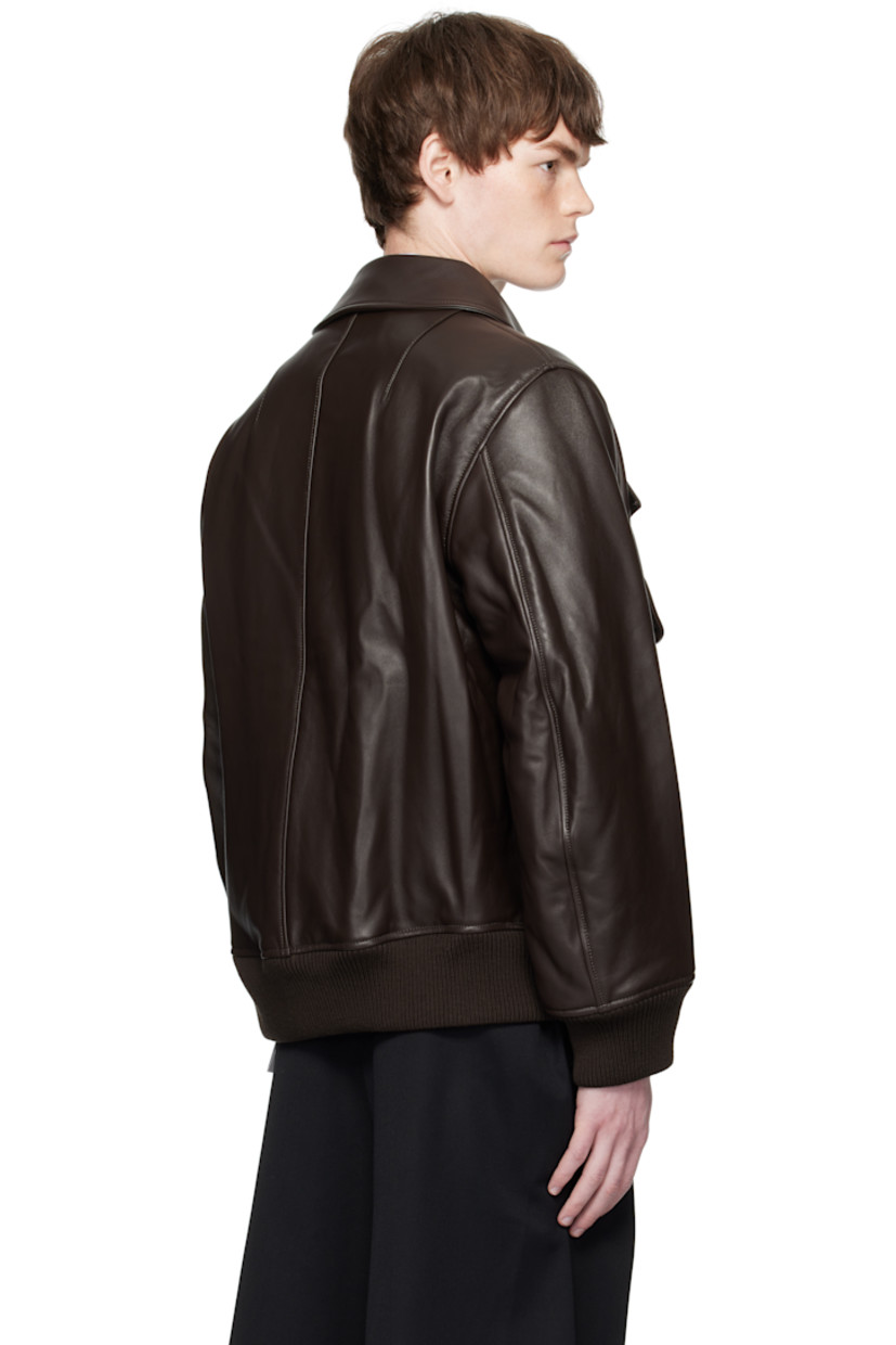 Padded buffed nappa lambskin jacket.

· Spread collar
· Two-way zip closure
· Bellows pockets at front
· Rib-knit merino wool hem and cuffs
· Welt pocket at interior
· Full satin lining

Supplier color: Chocolate