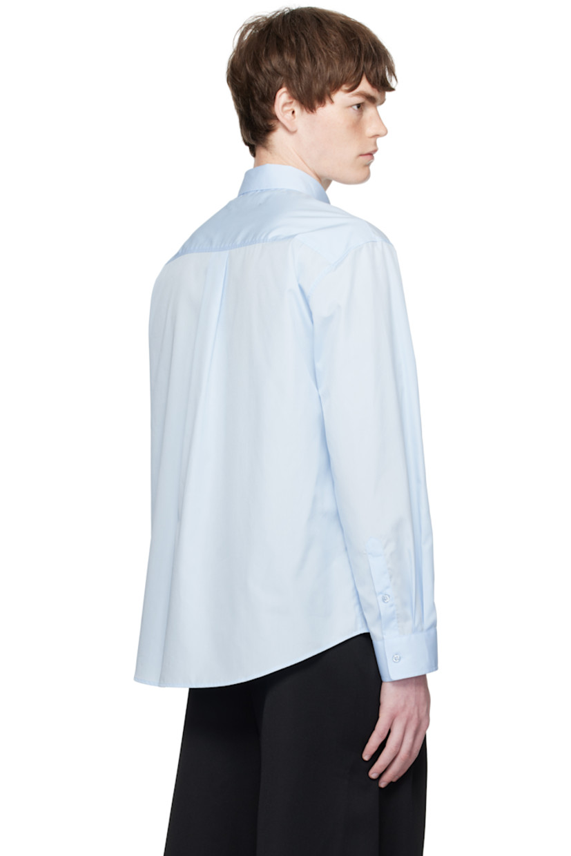 Cotton poplin shirt.

· Faux-pearl floral accents at spread collar
· Button closure
· Patch pocket at chest
· Shirttail hem
· Buttoned barrel cuffs
· Box pleat at back yoke

Supplier color: Baby blue/Pearl