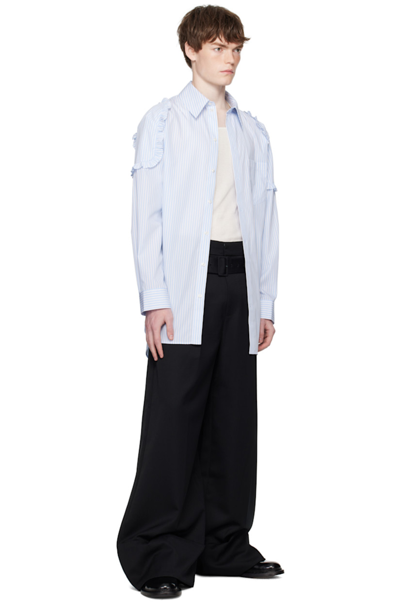 Cotton poplin shirt.

· Stripes throughout
· Spread collar
· Button closure
· Patch pocket at chest
· Shirttail hem
· Ruffled trim at shoulders
· Buttoned barrel cuffs
· Box pleat at back yoke

Supplier color: White/Blue
