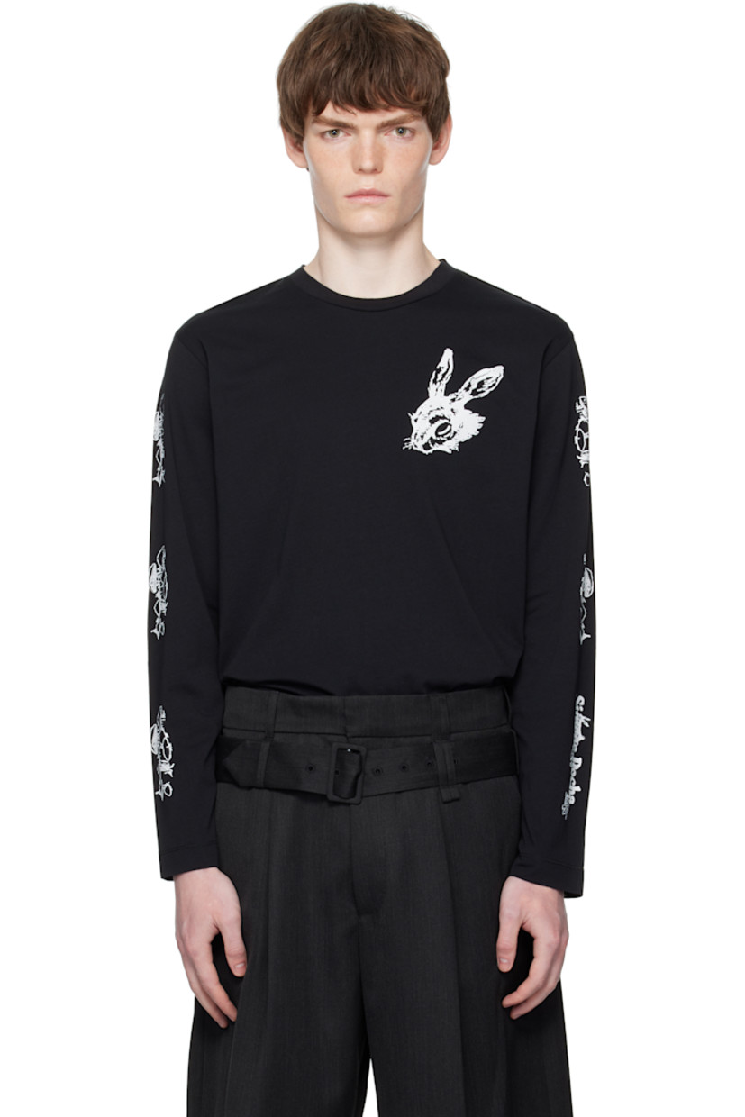 Cotton jersey T-shirt.

· Graphics printed throughout
· Rib-knit crewneck
· Logo printed at sleeve

Featuring artwork by Oscar Torrans.

Supplier color: Black/White