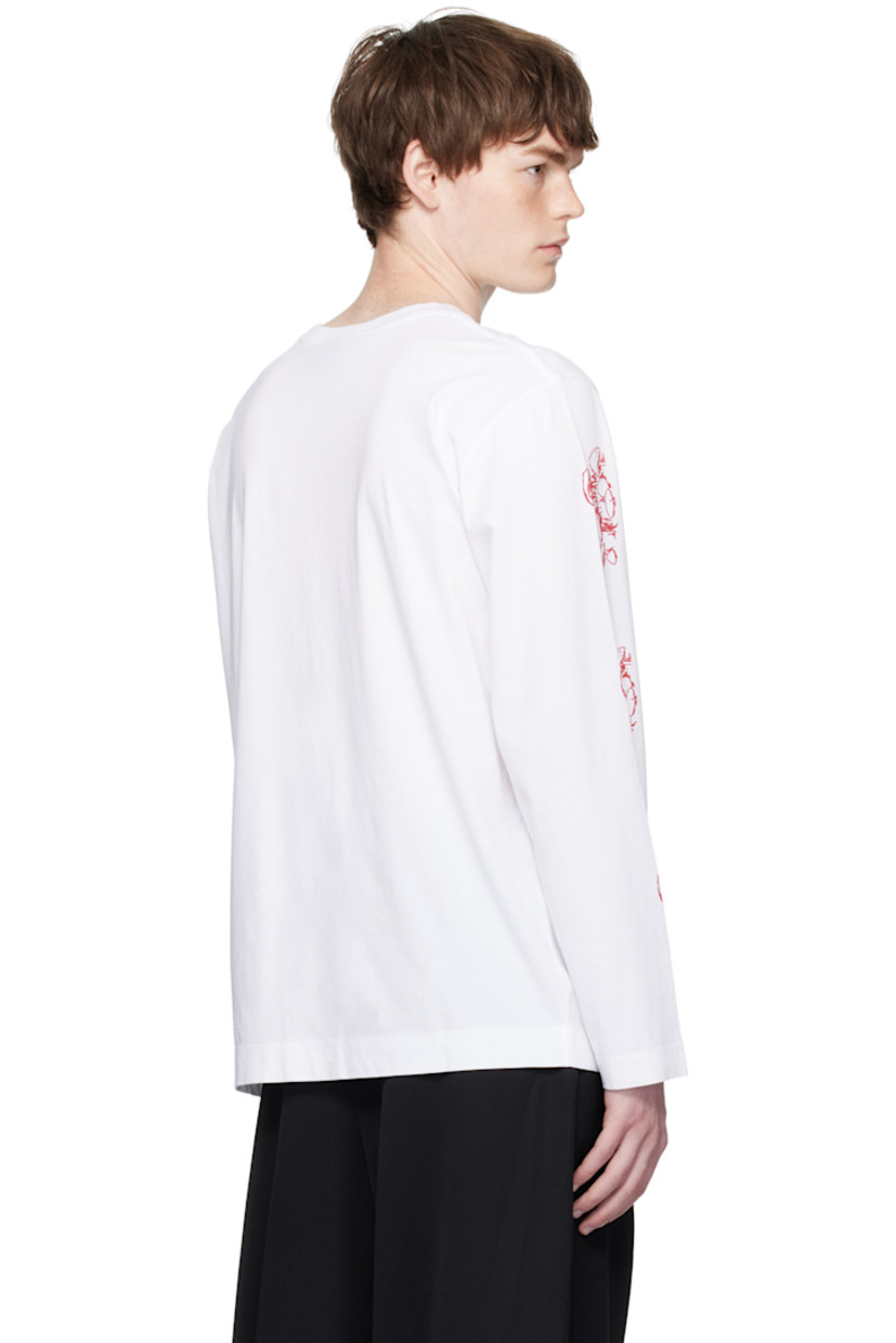 Cotton jersey T-shirt.

· Graphics printed throughout
· Rib-knit crewneck
· Logo printed at sleeve

Featuring artwork by Oscar Torrans.

Supplier color: White/Red