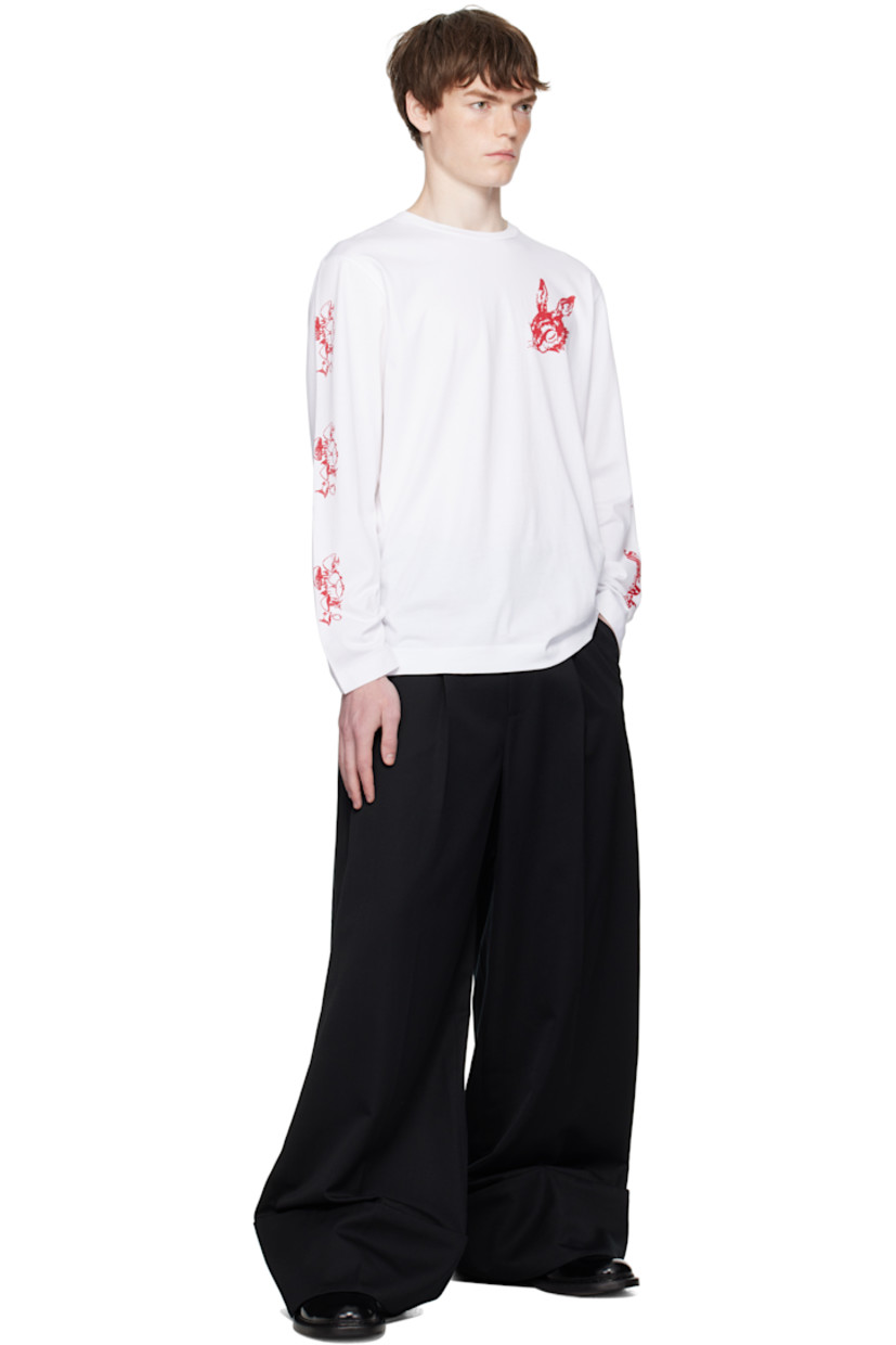 Cotton jersey T-shirt.

· Graphics printed throughout
· Rib-knit crewneck
· Logo printed at sleeve

Featuring artwork by Oscar Torrans.

Supplier color: White/Red