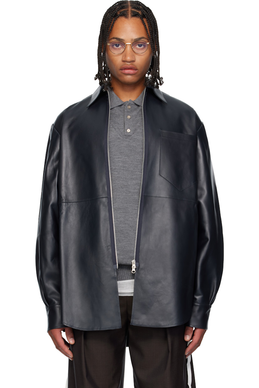 Grained lambskin jacket.

· Button closure at spread collar 
· Two-way zip closure 
· Patch pocket at chest 
· Shirttail hem 
· Pleats at buttoned barrel cuffs
· Unlined 

Supplier color: Navy
