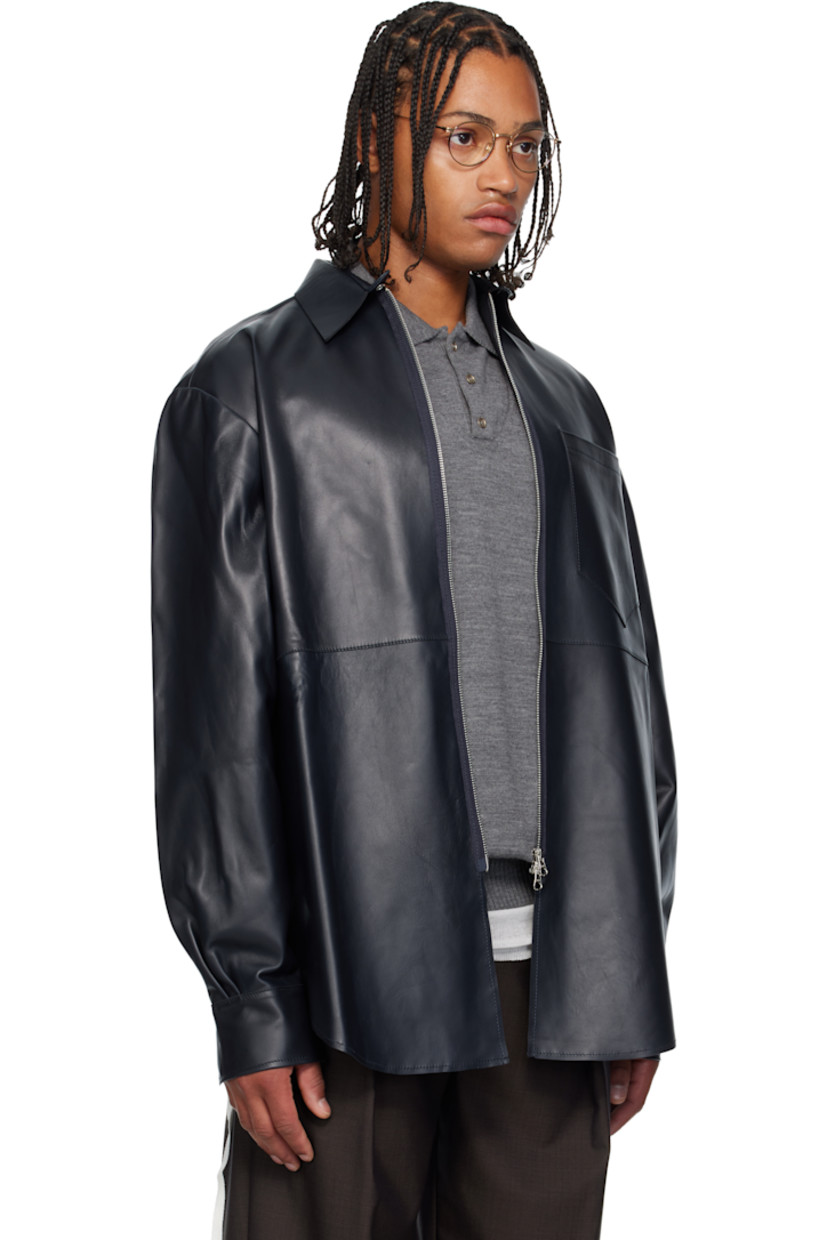 Grained lambskin jacket.

· Button closure at spread collar 
· Two-way zip closure 
· Patch pocket at chest 
· Shirttail hem 
· Pleats at buttoned barrel cuffs
· Unlined 

Supplier color: Navy