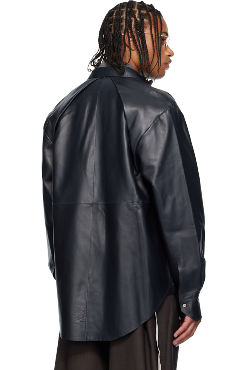 Grained lambskin jacket.

· Button closure at spread collar 
· Two-way zip closure 
· Patch pocket at chest 
· Shirttail hem 
· Pleats at buttoned barrel cuffs
· Unlined 

Supplier color: Navy