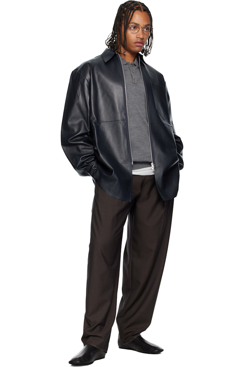 Grained lambskin jacket.

· Button closure at spread collar 
· Two-way zip closure 
· Patch pocket at chest 
· Shirttail hem 
· Pleats at buttoned barrel cuffs
· Unlined 

Supplier color: Navy