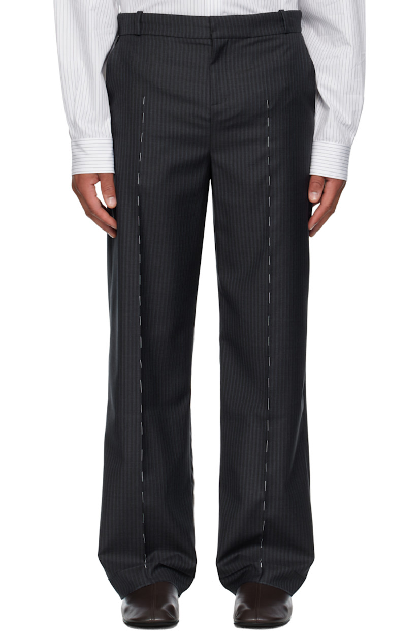 Virgin wool twill trousers.

· Stripes throughout 
· Belt loops
· Four-pocket styling
· Zip fly 
· Leather D-ring tab at front waist
· Creased legs
· Unfinished hem
· Contrast stitching in white 

Supplier color: Anthracite