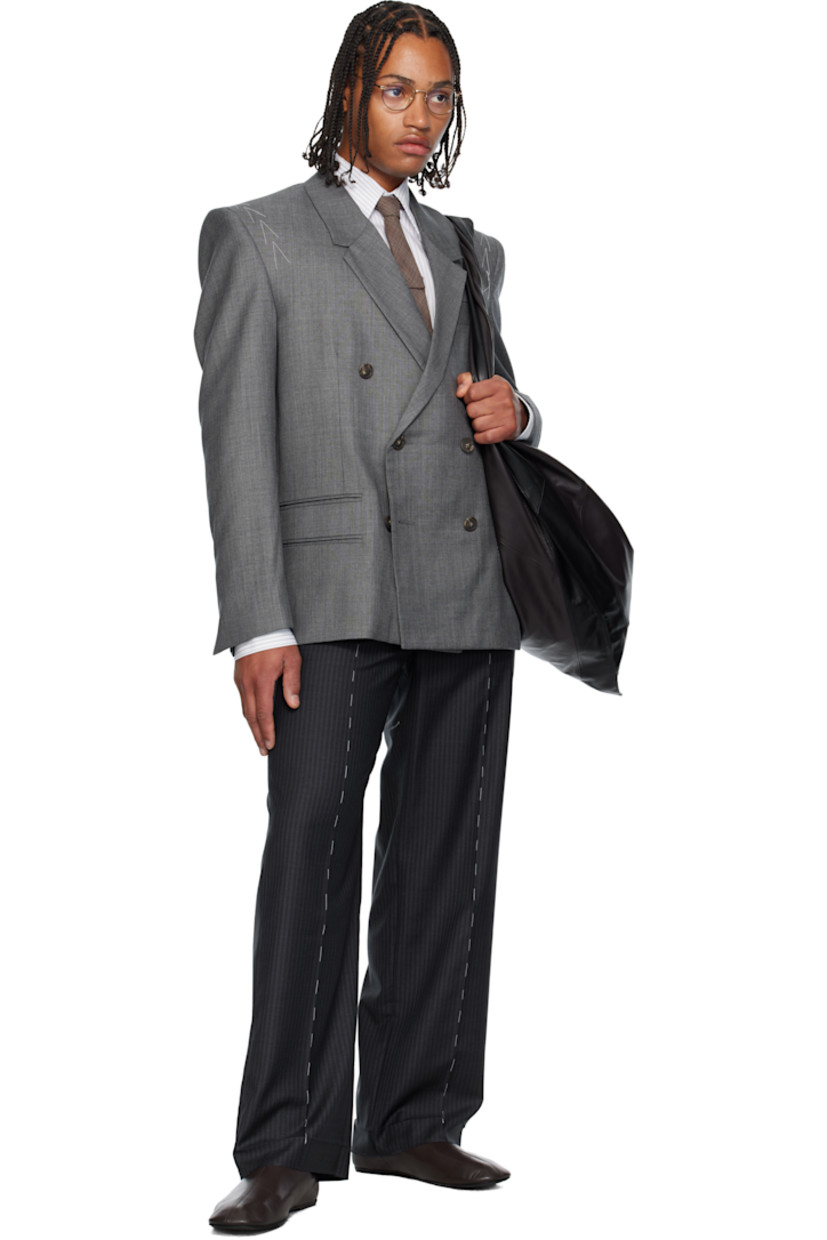 Virgin wool twill trousers.

· Stripes throughout 
· Belt loops
· Four-pocket styling
· Zip fly 
· Leather D-ring tab at front waist
· Creased legs
· Unfinished hem
· Contrast stitching in white 

Supplier color: Anthracite