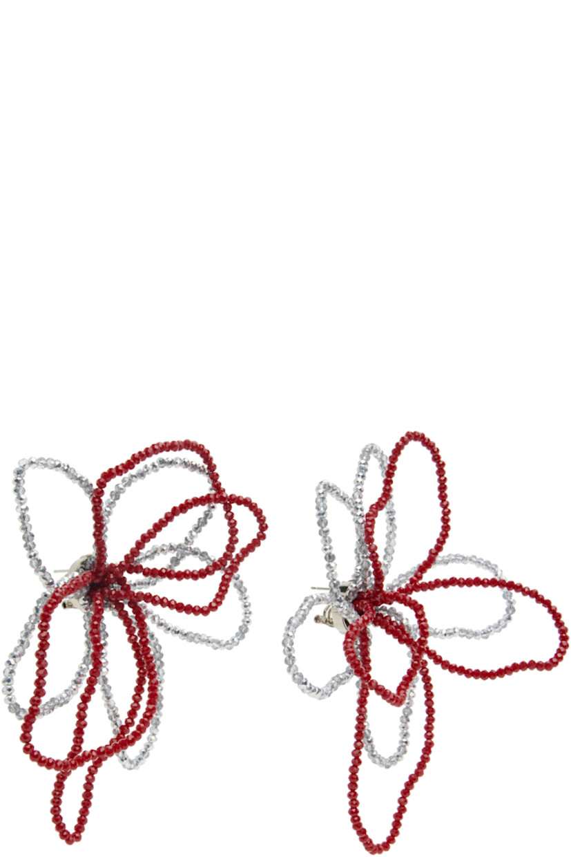 Pair of drop earrings in galvanized steel.

· Red and silver-tone floral crystals at face
· Silver-tone brass post-stud fastening 
· D4"

Supplier color: Multi red/Mirrored