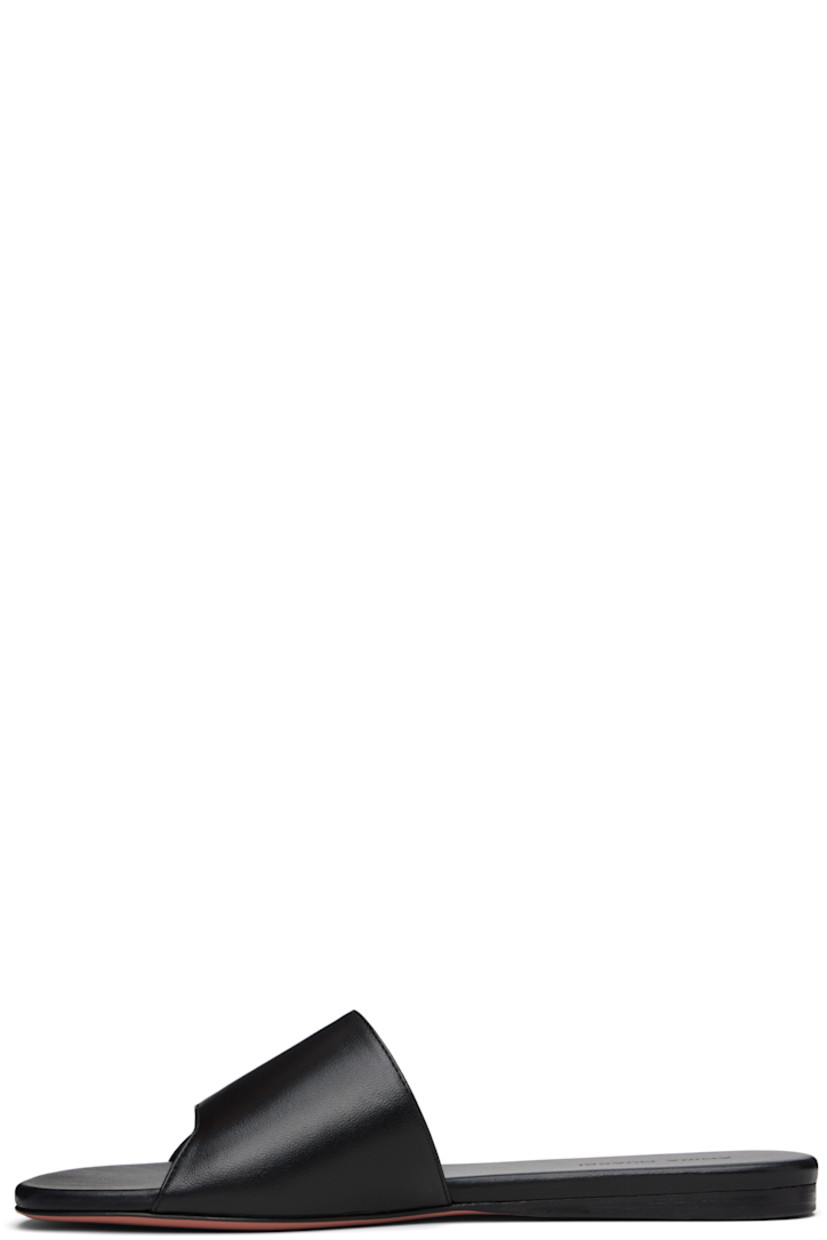 Grained nappa lambskin slip-on sandals in black. 

· Open square toe 
· Strap at vamp
· Logo embossed at footbed
· Stacked leather midsole
· Leather sole with rubber injection

Supplier color: Nappa black