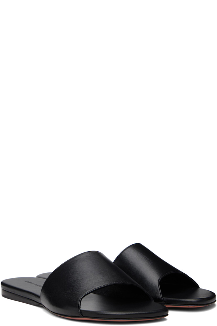 Grained nappa lambskin slip-on sandals in black. 

· Open square toe 
· Strap at vamp
· Logo embossed at footbed
· Stacked leather midsole
· Leather sole with rubber injection

Supplier color: Nappa black