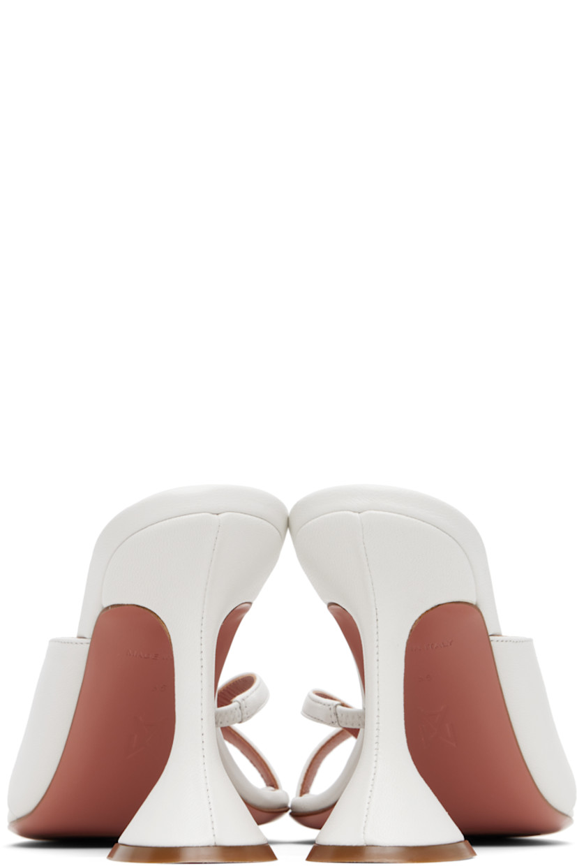 Grained nappa leather heeled sandals in white.

· Open square toe
· Thong-style strap at vamp
· Covered spool heel with rubber injection 
· Polished leather sole with rubber injection
· Heel: H3.75"

Supplier color: Nappa white