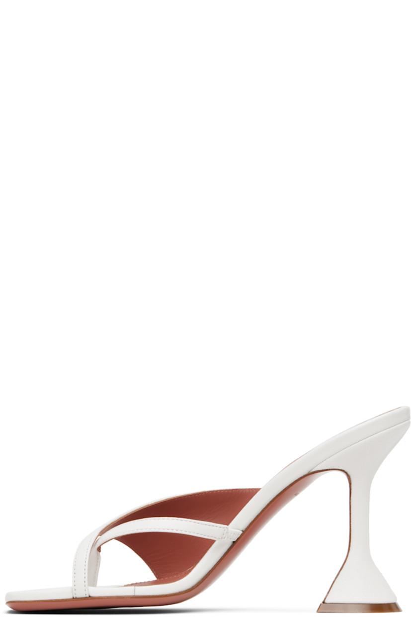 Grained nappa leather heeled sandals in white.

· Open square toe
· Thong-style strap at vamp
· Covered spool heel with rubber injection 
· Polished leather sole with rubber injection
· Heel: H3.75"

Supplier color: Nappa white