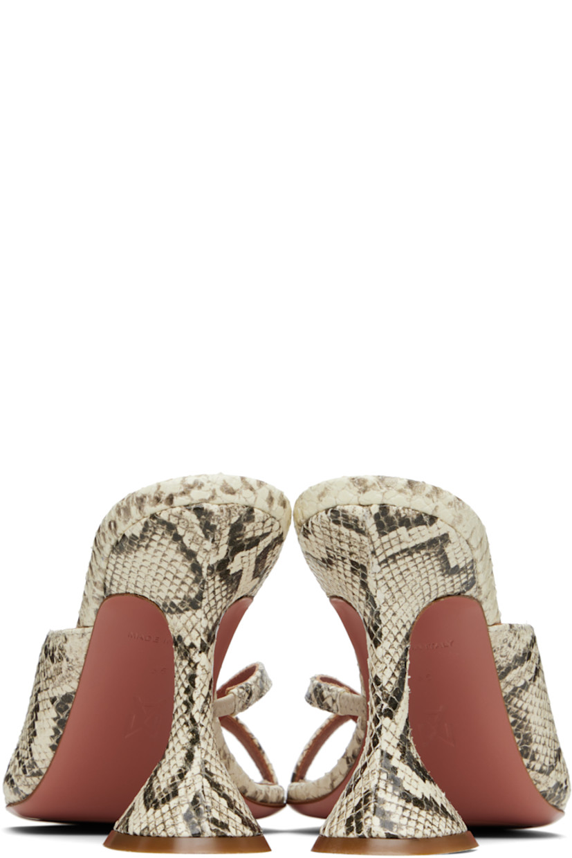 Snake-embossed leather heeled sandals in off-white and black.

· Open square toe
· Thong-style strap at vamp
· Covered spool heel with rubber injection 
· Polished leather sole with rubber injection
· Heel: H3.75"

Supplier color: Print snake natural