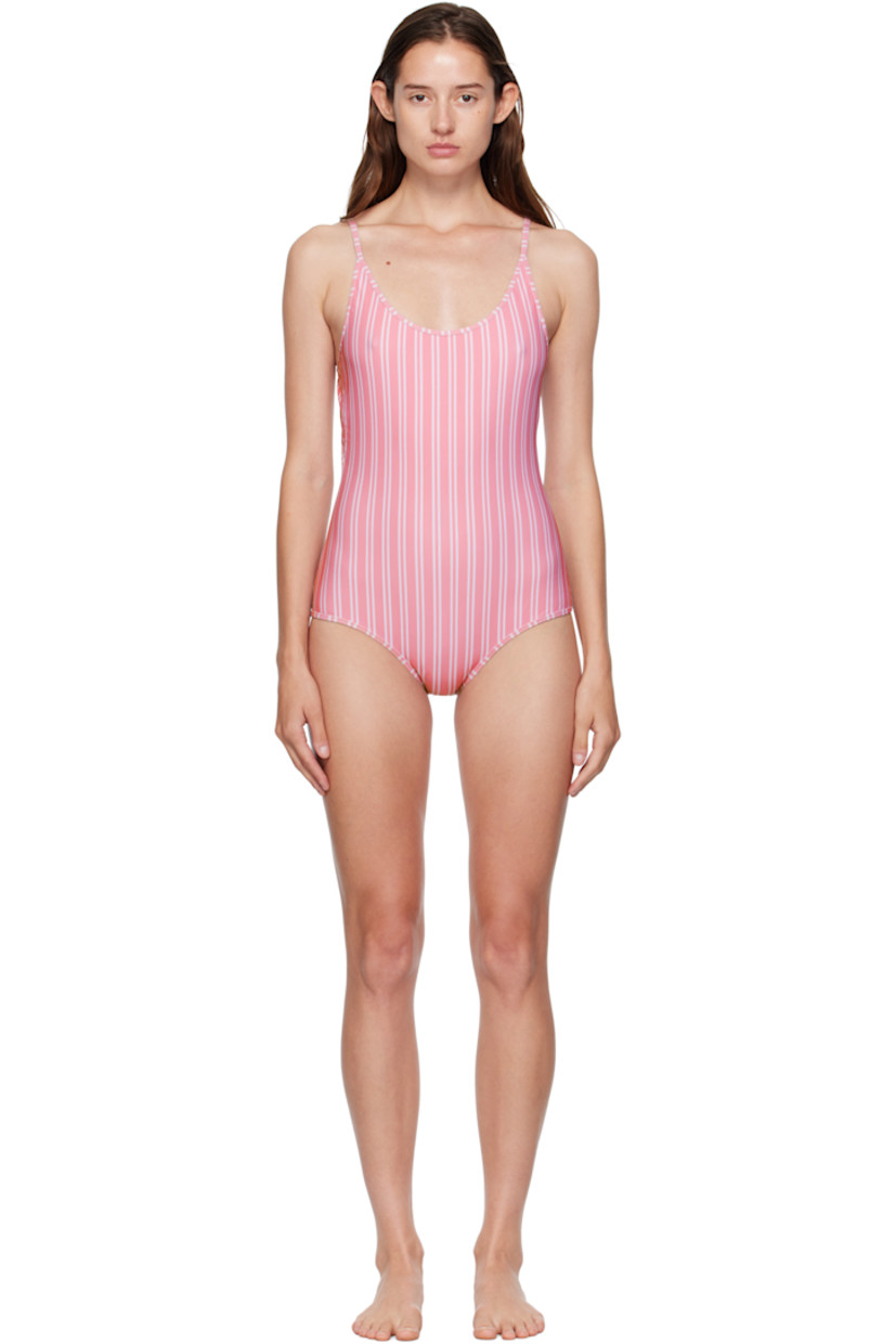 Stretch recycled jersey one-piece swimsuit. 

· Stripe pattern printed throughout
· Scoop neck
· Adjustable spaghetti straps
· Cutout at back
· Self-tie fastening with beads at back
· Drawstring travel pouch included

Supplier color: Pink Stripe