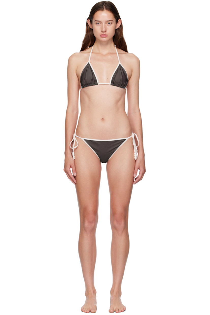 Stretch recycled jersey bikini top and bottom.

· Self-tie halter and fastening at back
· Self-tie fastening at bottom sides
· Beads at strap ends
· Fully lined
· Drawstring travel pouch included

Available exclusively at SSENSE.

Supplier color: Brown/White