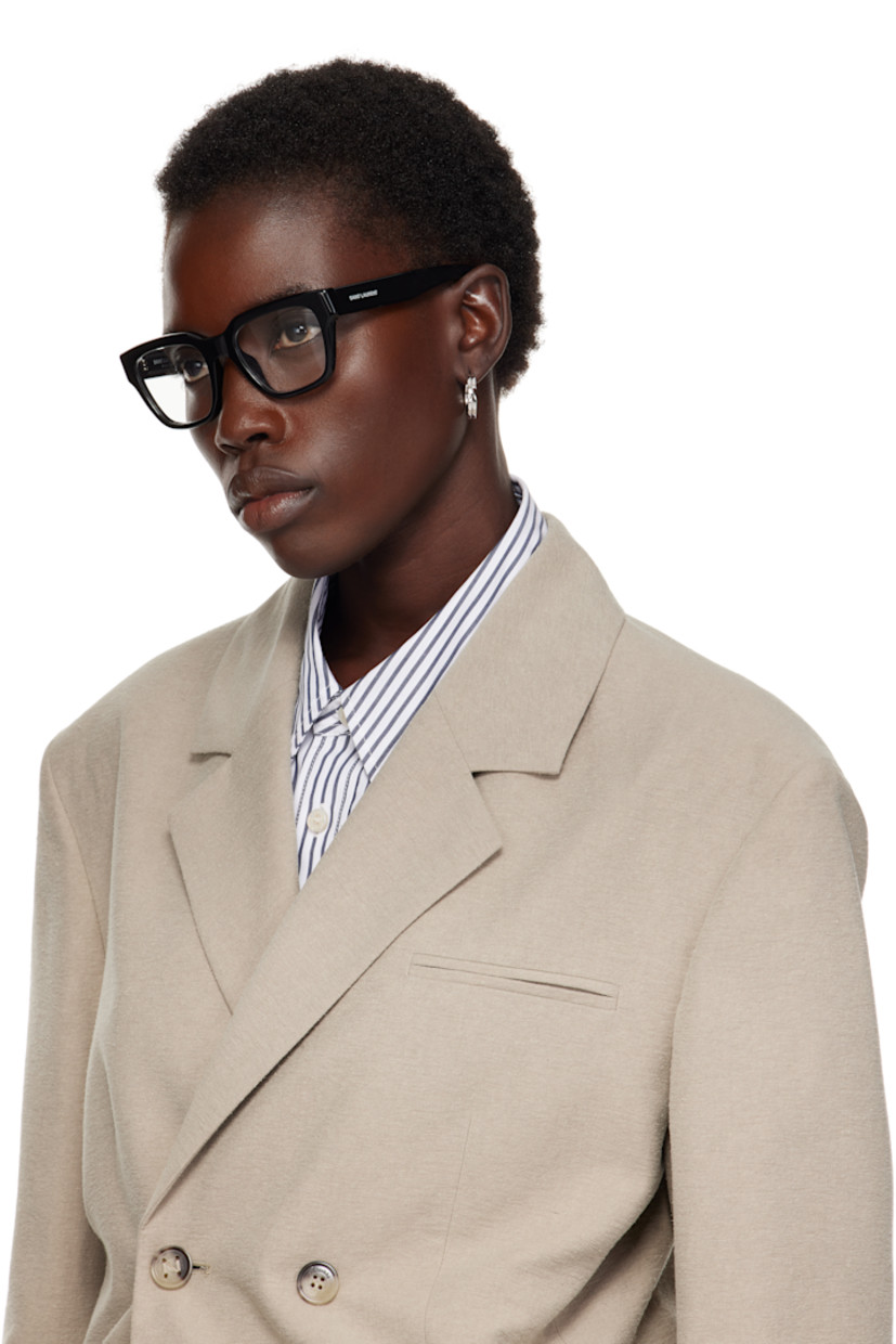 Square acetate-frame optical glasses in black.

· Integrated nose pads
· Logo stamp at temples
· Includes case
· Size: 51.20 145

Supplier color: Black
