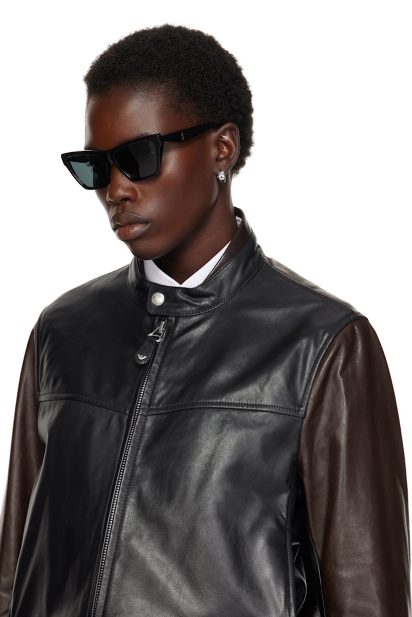 Cat-eye acetate-frame sunglasses in black.

· Gray lenses, category 3
· 100% UVA/UVB protection
· Integrated nose pads
· Logo hardware at temples
· Includes case
· Size: 58.15 145

Supplier color: Black/Light gold