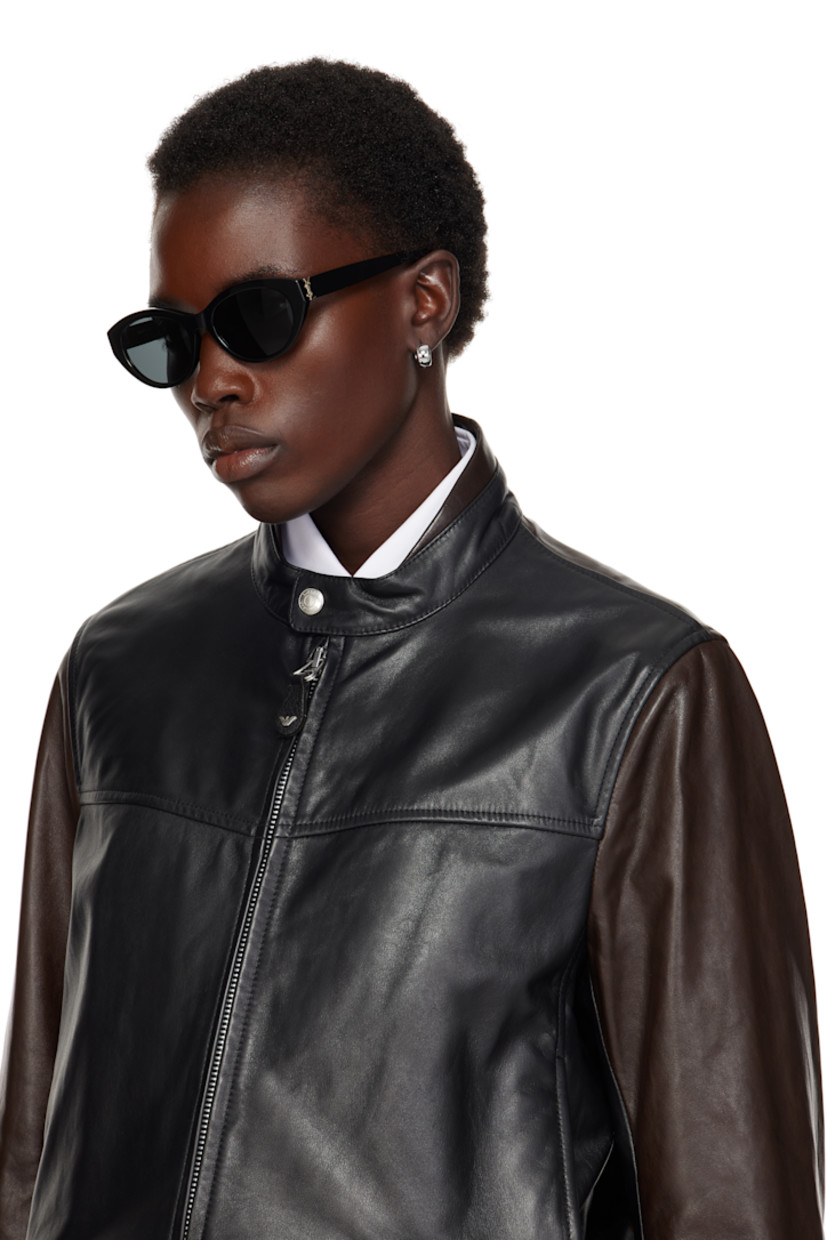 Cat-eye acetate-frame sunglasses in black.

· Gray lenses, category 3
· 100% UVA/UVB protection
· Integrated nose pads
· Logo hardware at hinges
· Includes case
· Size: 54.18 140

Supplier color: Black/Light gold/Black