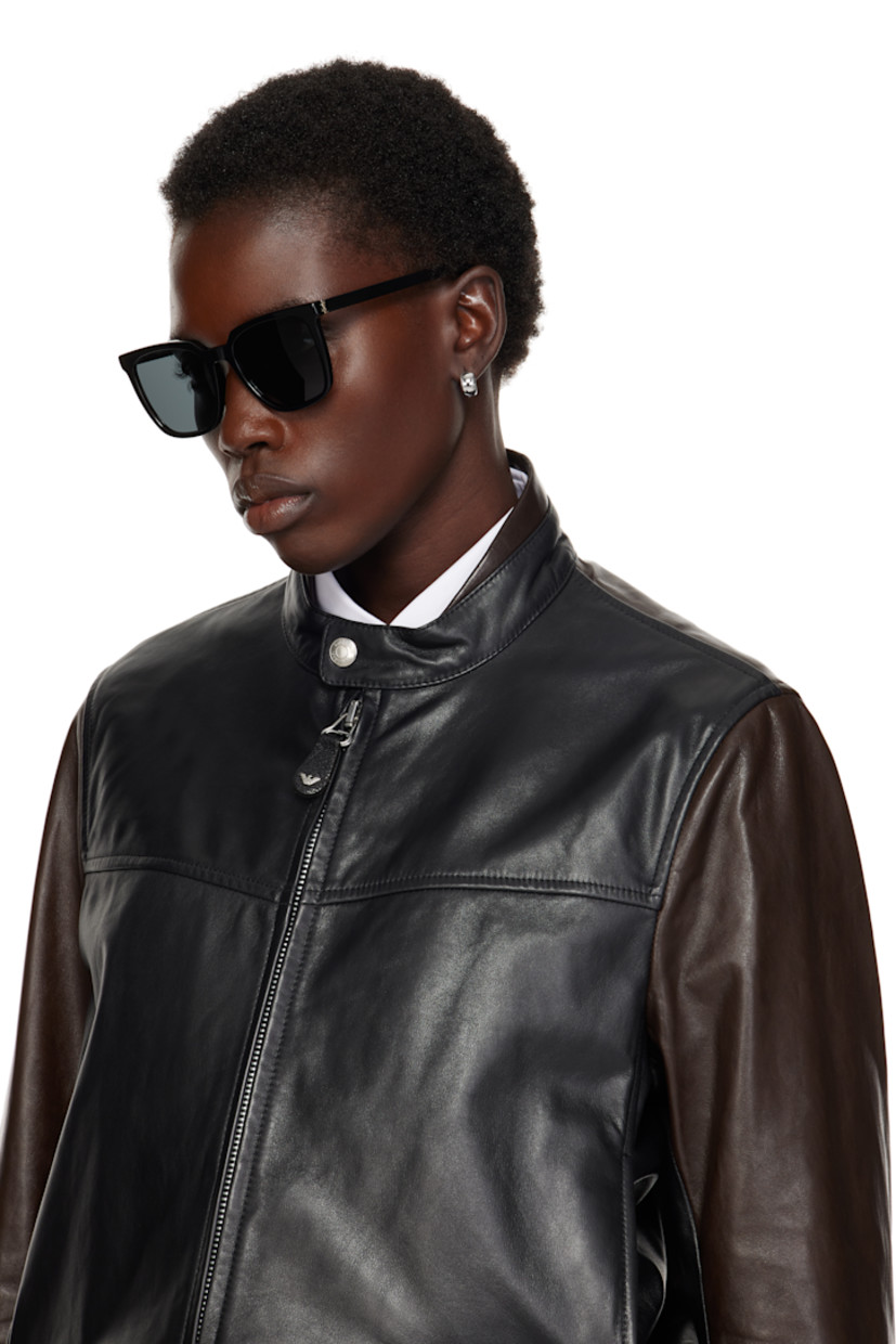 Square acetate-frame sunglasses in black.

· Gray lenses, category 3
· 100% UVA/UVB protection
· Integrated nose pads
· Logo hardware at hinges
· Includes case
· Size: 54.19 145

Supplier color: Black/Light gold/Black