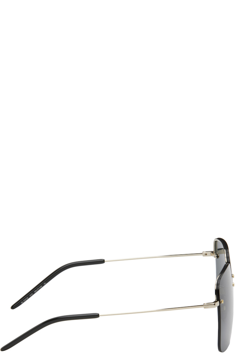 Square rimless metal-frame sunglasses in gold tone.

· Gray lenses, category 3
· 100% UVA/UVB protection
· Logo hardware at lens
· Adjustable metal nose pads
· Acetate temple tips
· Includes case
· Size: 58.17 145

Supplier color: Gold