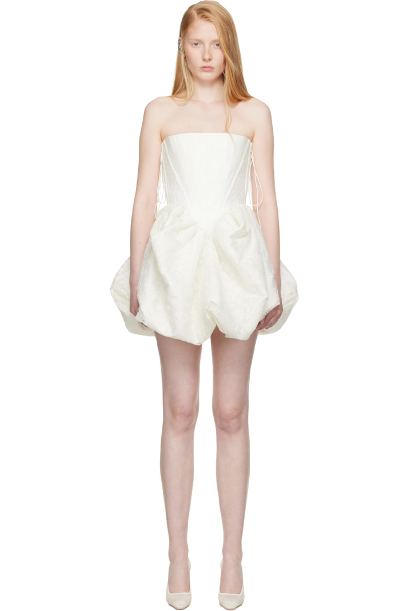 Cotton-blend twill minidress. Floral lace overlay. 

· Straight neck
· Boning at bodice
· Gathering at waist
· Bubble hem 
· Lace-up closure at side seams 

Part of the SSENSE Bridal capsule.

Supplier color: White/Ivory