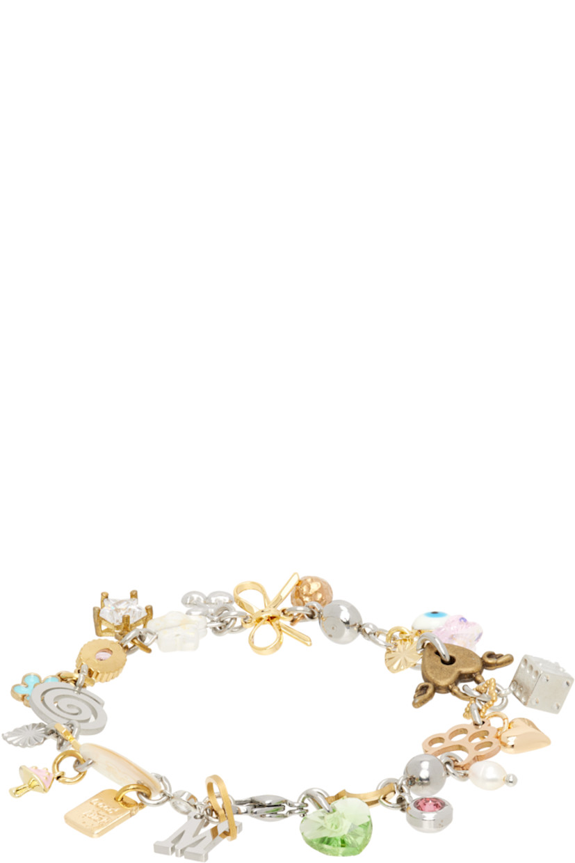 Modified cable chain bracelet in stainless steel.

· Graphic charms with crystals, resin inlays, and pearls throughout 
· Lobster-clasp fastening 
· L6.5"

Supplier color: Multi