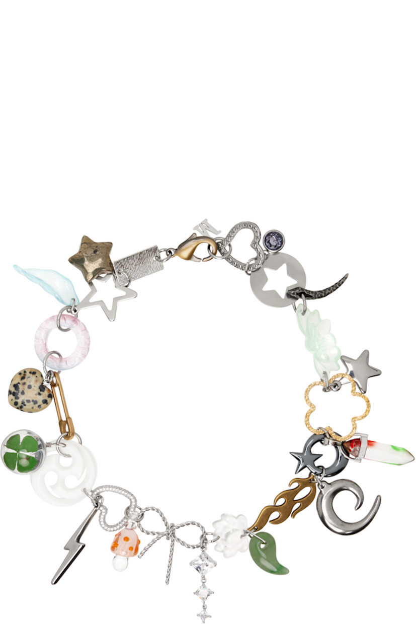 Modified cable chain bracelet in stainless steel.

· Graphic charms with glass crystals, shells, and stones throughout
· Lobster-clasp fastening
· L6.5"

Supplier color: Silver colorway