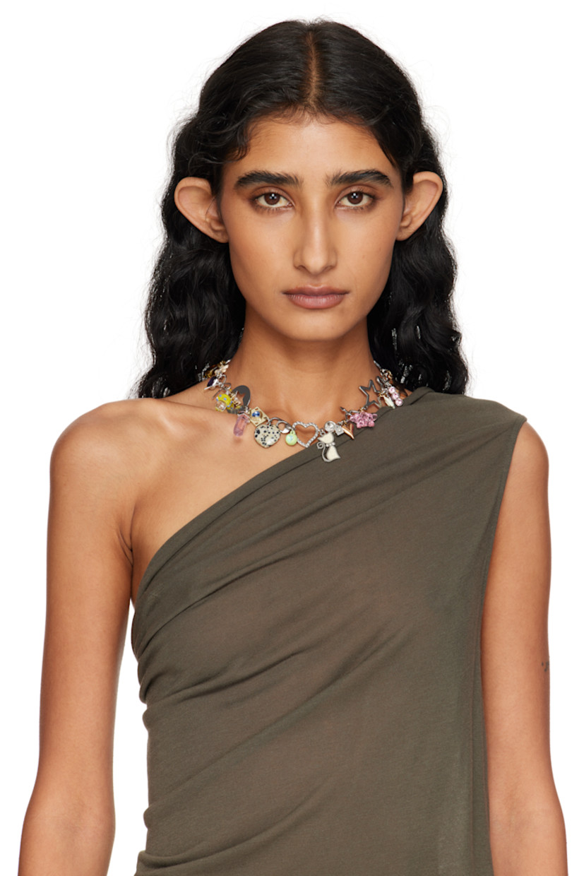 Modified cable chain necklace in silver- and gold-tone stainless steel.

· Graphic charms and crystals throughout
· Logo charm at adjustable lobster-clasp fastening
· L18"

Supplier color: Multi