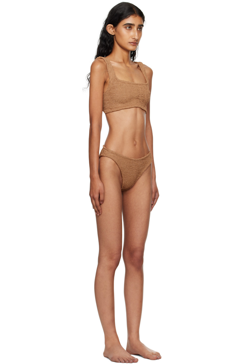 Shirred stretch nylon jersey bikini top and bottom.

· Square neck
· Integrated shoulder straps
· Low back
· Unlined

This product uses Original Crinkle™ Technology. Fits US size 2-12.

Supplier color: Metallic cocoa