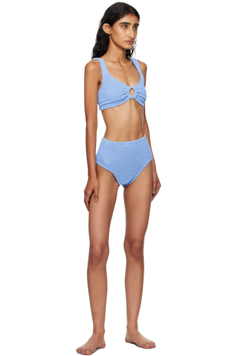 Shirred stretch nylon jersey bikini top and bottom.

· Scoop neck
· Covered O-ring and gathering at chest 
· High-waisted bottom
· Integrated shoulder straps
· Low back
· Unlined

This product uses Original Crinkle™ Technology. Fits US size 2-12.

Supplier color: Cornflower