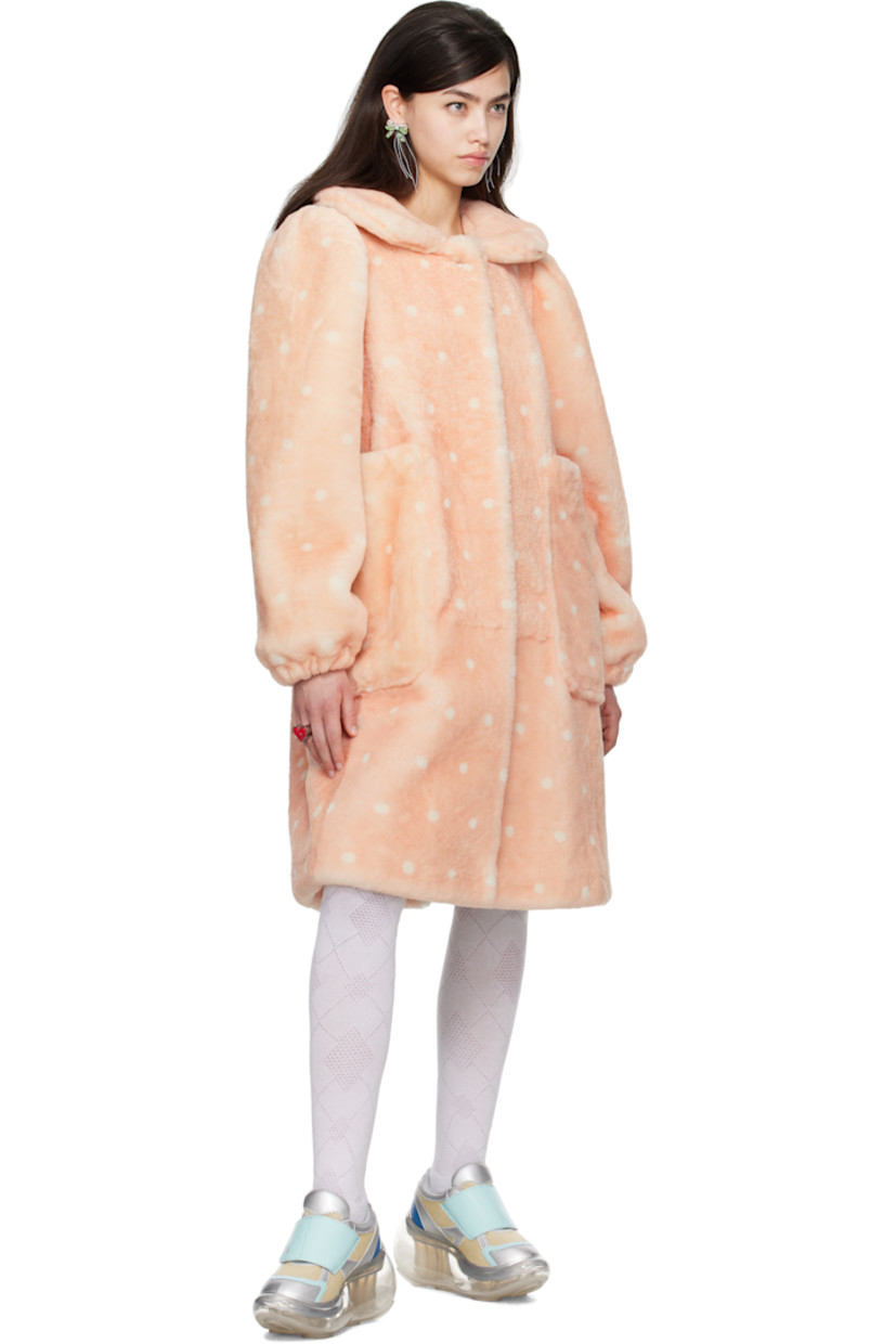 Shearling coat. Polka dot pattern printed throughout.

· Integrated pliable wire at collar
· Button closure
· Patch pockets
· Balloon sleeves
· Elasticized cuffs
· Central vent at back hem
· Full viscose satin lining

Part of the I'm Sorry by Petra Collins x JennyFax collaboration.

Supplier color: Pink/Polka dots