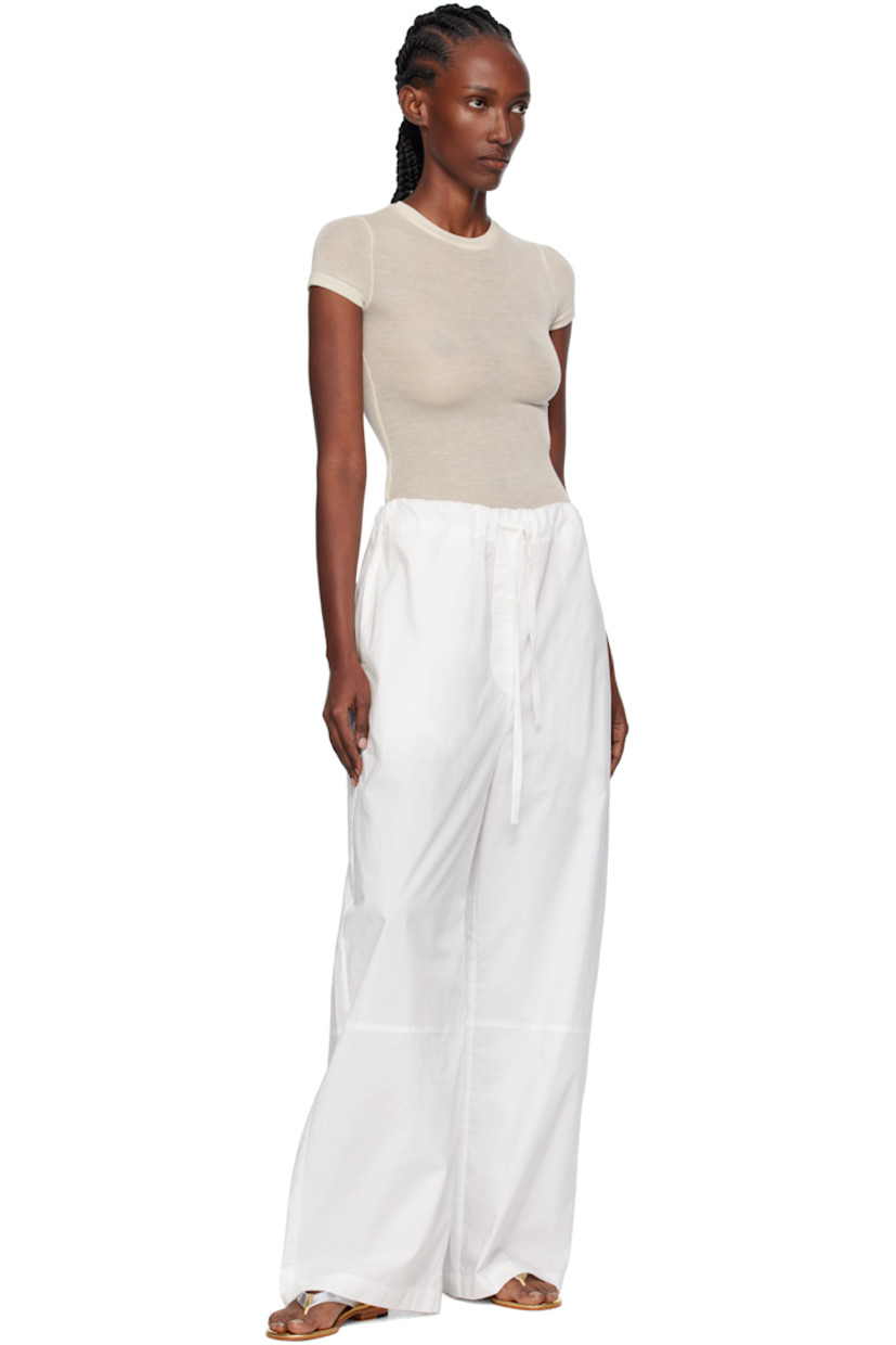 Cotton poplin trousers.

· Drawstring at elasticized waistband
· Four-pocket styling

Supplier color: White
