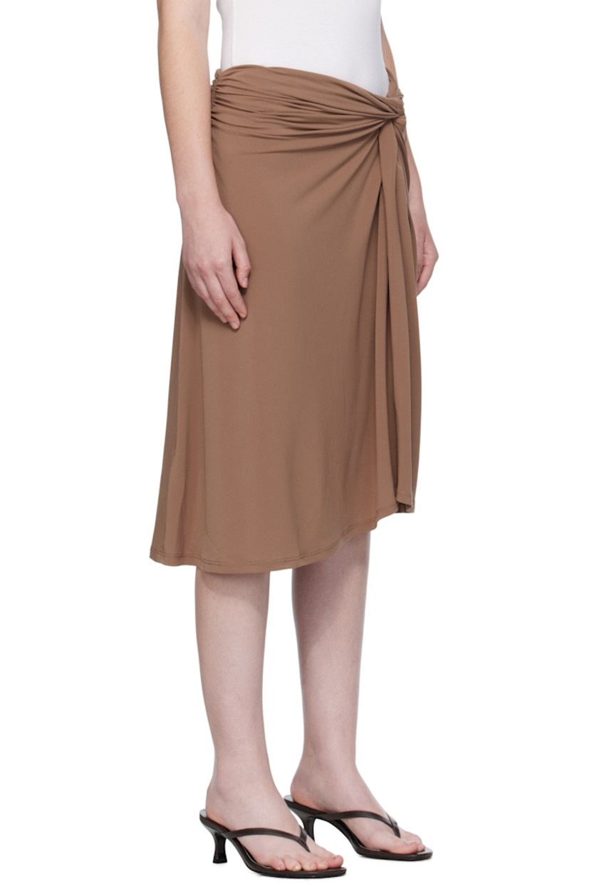 Stretch jersey midi skirt.

· Gathering at elasticized waistband 
· Twisted detailing at front 
· Slit at front 

Part of the Elemental 06 collection.

Supplier color: Chestnut