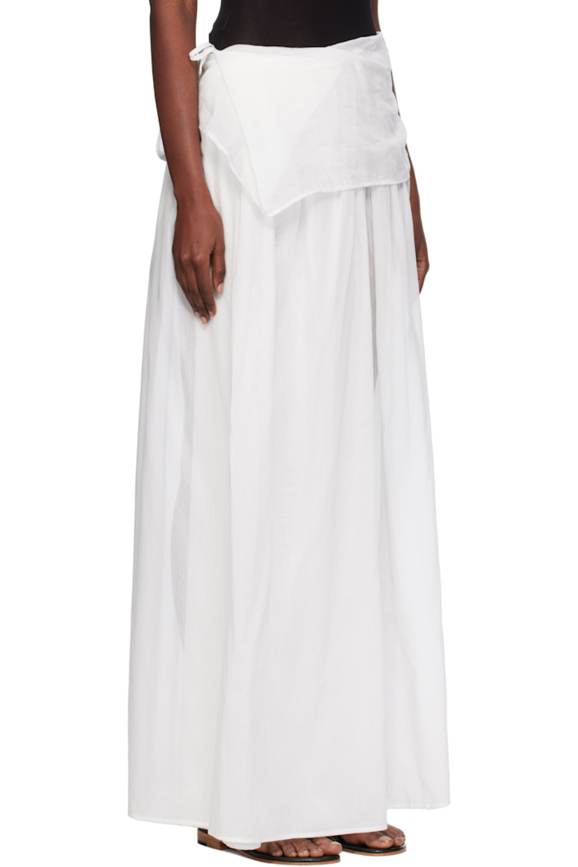 Semi-sheer deadstock cotton- and silk-blend voile maxi skirt.

· Foldover waistband
· Self-tie fastening at side

Supplier color: White