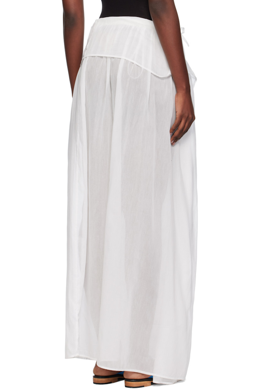 Semi-sheer deadstock cotton- and silk-blend voile maxi skirt.

· Foldover waistband
· Self-tie fastening at side

Supplier color: White