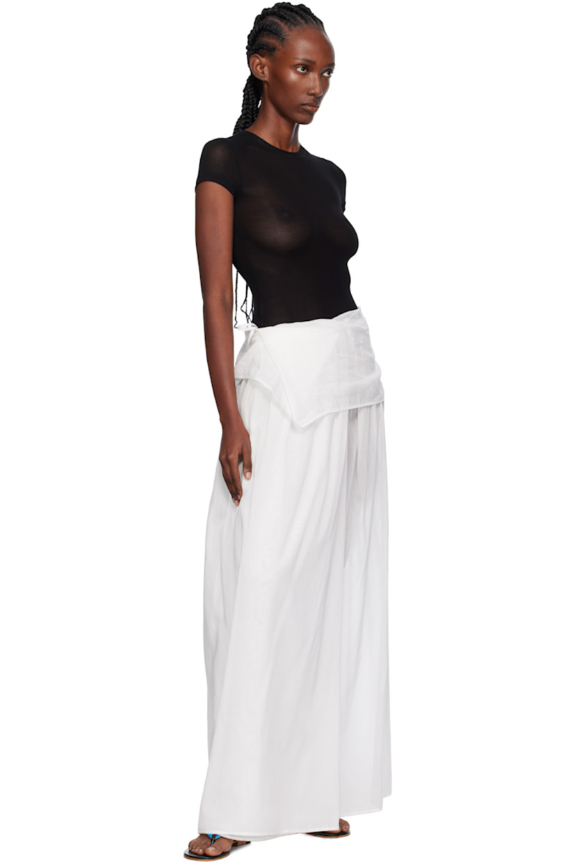 Semi-sheer deadstock cotton- and silk-blend voile maxi skirt.

· Foldover waistband
· Self-tie fastening at side

Supplier color: White