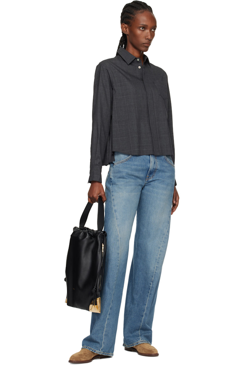 Grained lambskin shoulder bag. 

· Fixed shoulder strap
· Logo stamp at face
· Gold-tone plaques at corners
· Drawstring closure
· Felted lining 
· H14.5" x W15" x D0.5"

Supplier color: Black